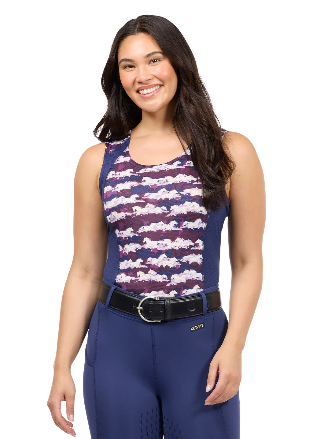 Front view of a female model wearing the purple Kerrits EquiBreeze Ice Fil Tank on a white background