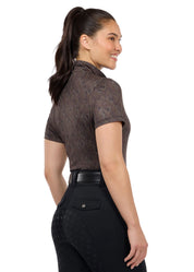 Woman wearing a brown short sleeve riding shirt, rear view