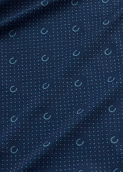 Close-up view of the pattern on the Nightfall Lucky Dots Kerrits In the Zone Coolcore Long Sleeve Riding Shirt