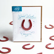 Front view of the Good Luck, Cowgirl Hunt Seat Paper Co. Greeting Card in its packaging