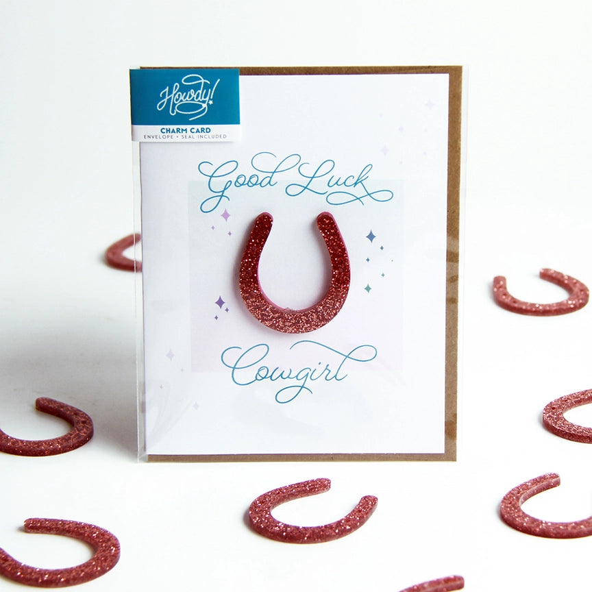 Front view of the Good Luck, Cowgirl Hunt Seat Paper Co. Greeting Card in its packaging