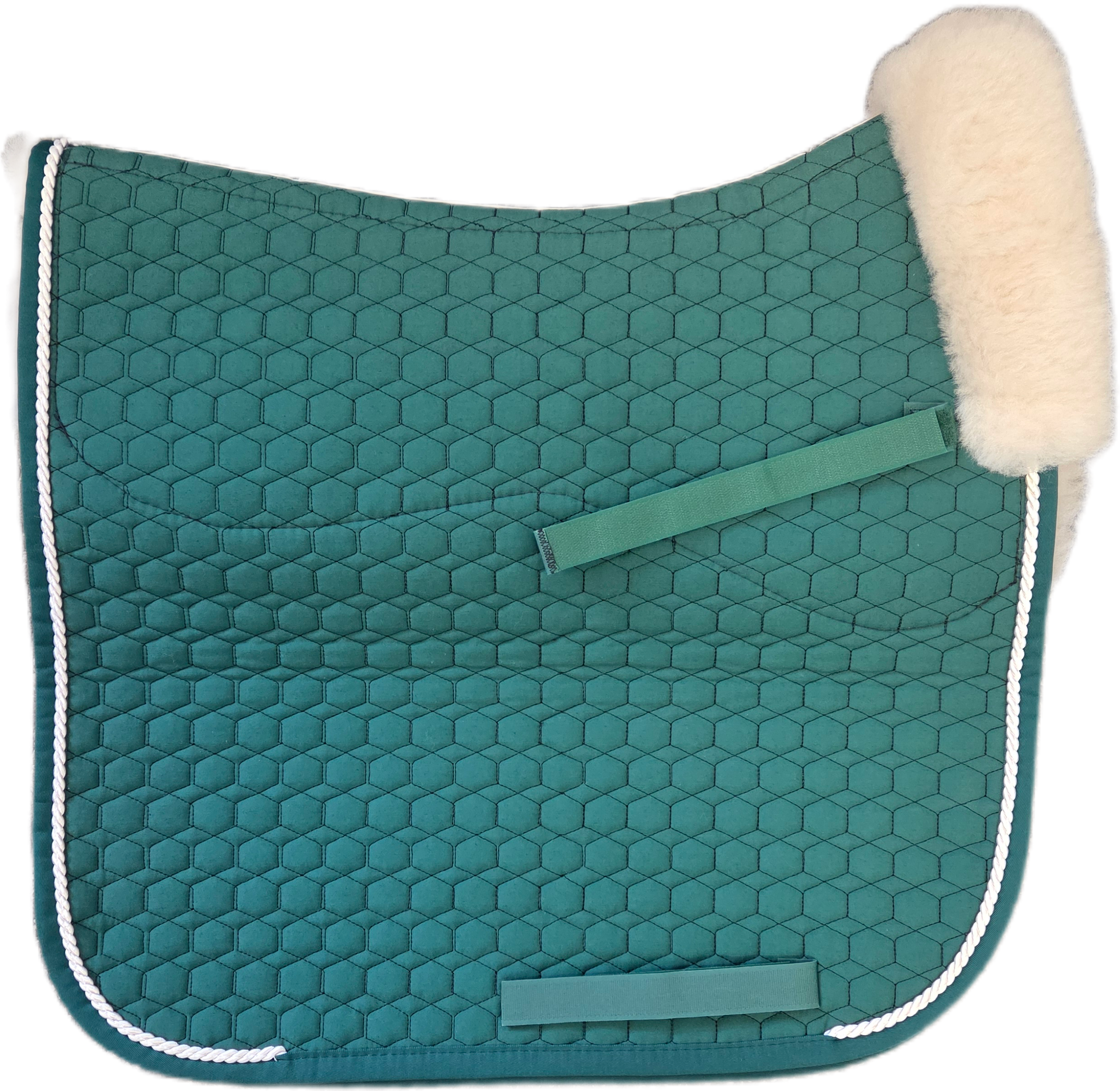 Green quilted dressage pad with cream piping with natural  sheepskin lining