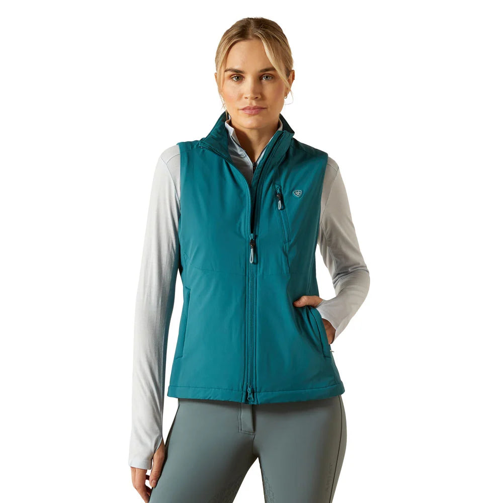 Full Zip vest shown in teal on model in front of plain white background