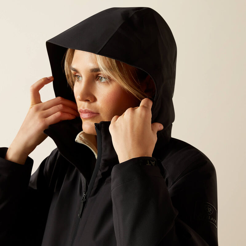 Black on black waterproof hooded raincoat shown on model