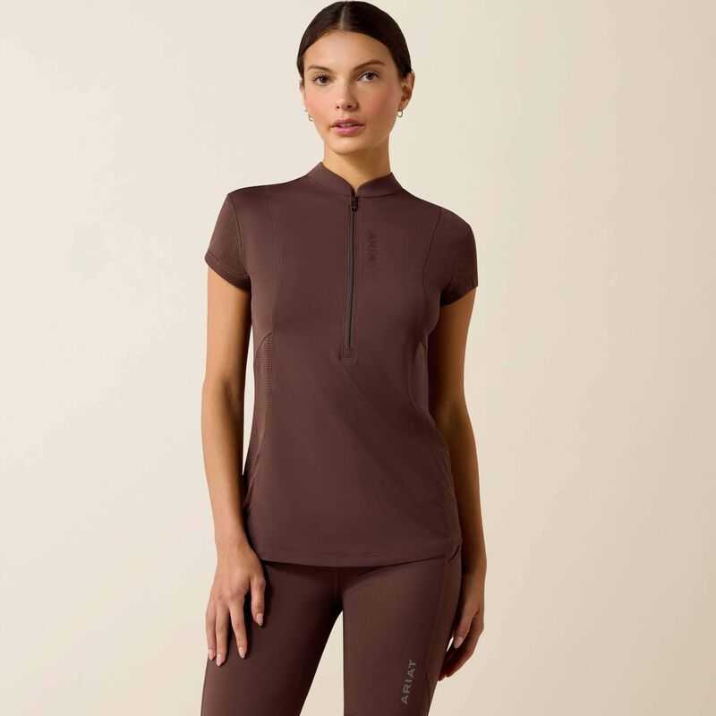 Front view of a model wearing the brown Ariat Breathe 1/2 Zip Baselayer on a plain background
