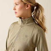 Angled front closeup view of a model wearing the Winter Twig Ariat Team EQ 1/2 Zip Pullover on a plain background showing the upper half of the pullover