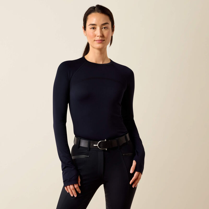 Front view of a model wearing the Show Navy Ariat Sustain Long Sleeve Baselayer