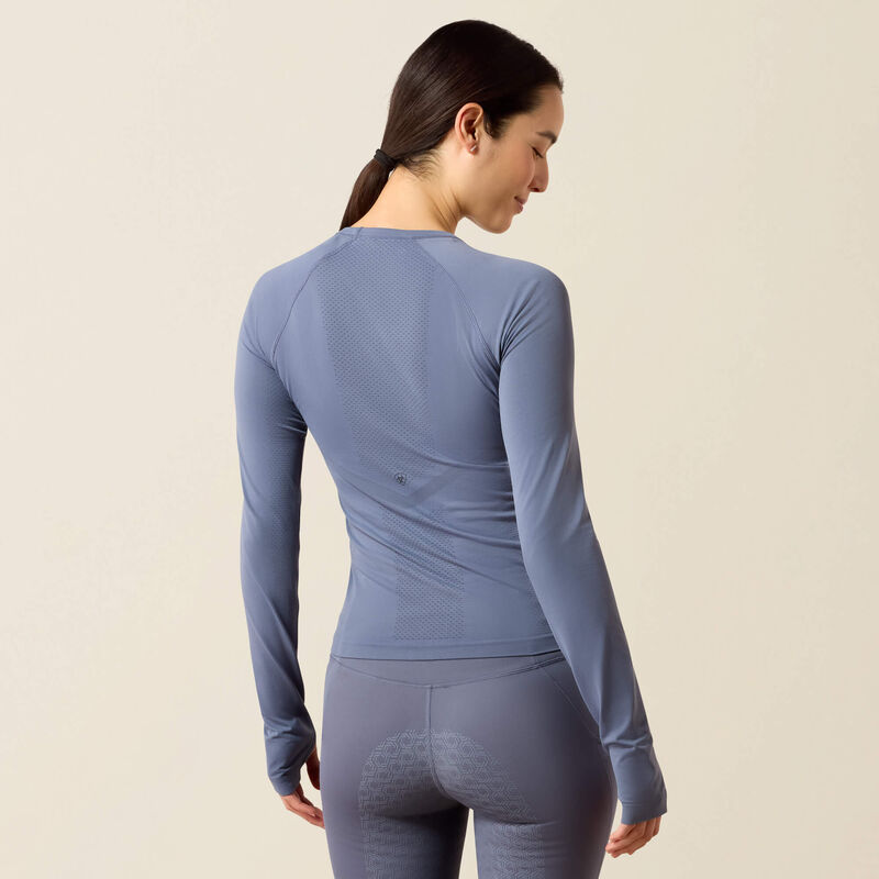 Back view of a model wearing the Grisaille Ariat Sustain Long Sleeve Baselayer