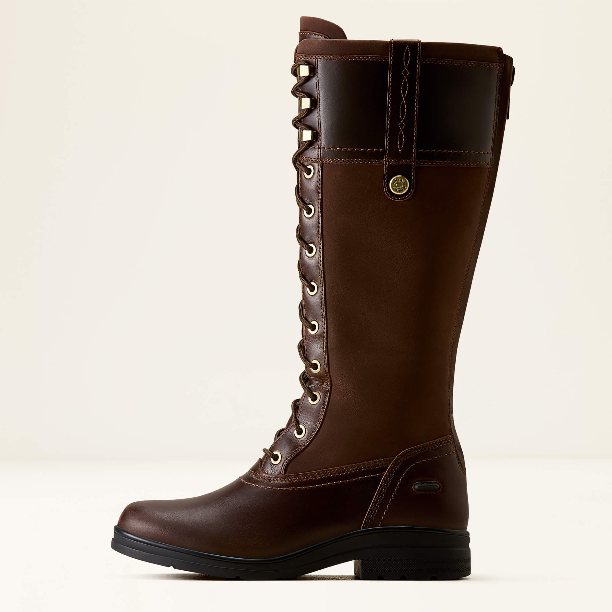 Side view of the Tobacco Brown Ariat Wythburn H20 Boot on a plain background
