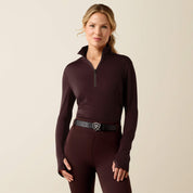 Front view of a female model wearing the Chocolate Plum Ariat Cheviot 1/4 Zip Long Sleeve Baselayer on a plain background