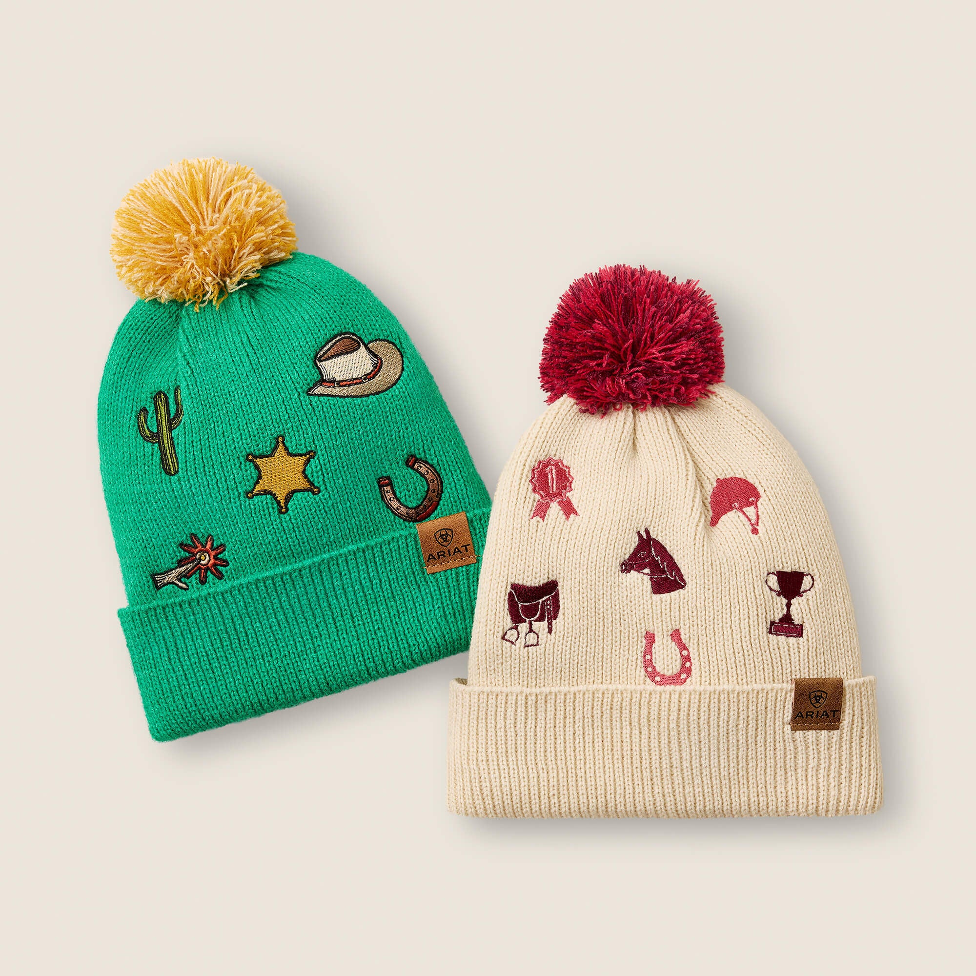 View of both the Natural and Teal Pathwork Ariat Youth Arlo Beanies on a plain background