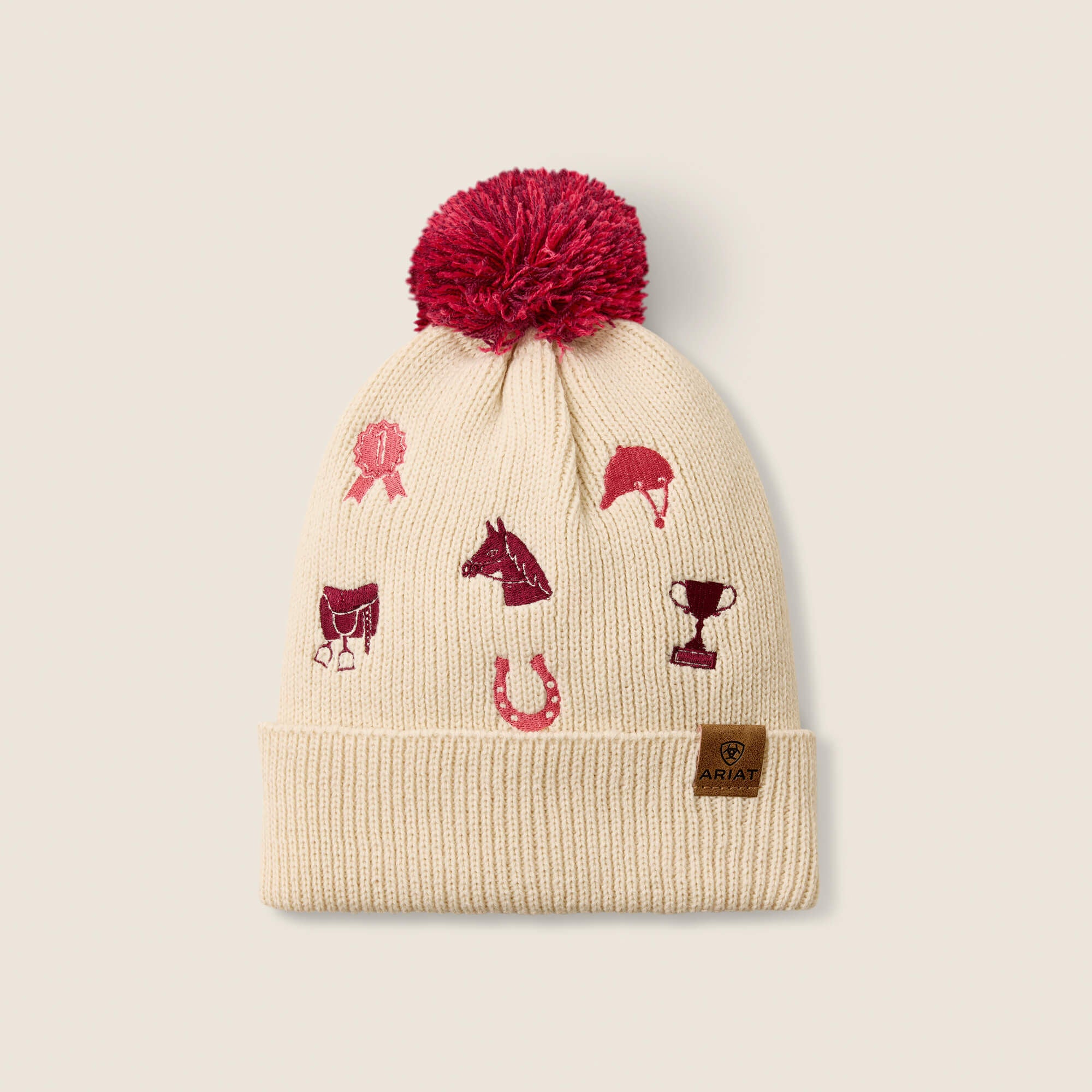 Front view of the Natural Patchwork Ariat Youth Arlo Beanie on a plain background