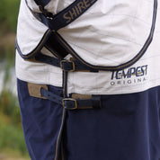 Close-up view of the chest straps on the Shires Tempest Original Summer Shield Set in white and navy