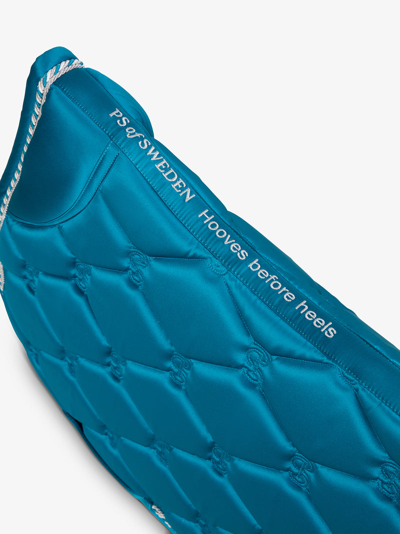 View of the spine on the Evening Teal PS of Sweden Signature Jump Pad on a plain background