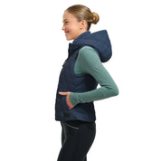 Side view of a female model wearing the Night Sky RJ Classics Riley Vest on a plain background