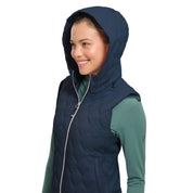 Angled front view of a female model wearing the Night Sky RJ Classics Riley Vest on a plain background