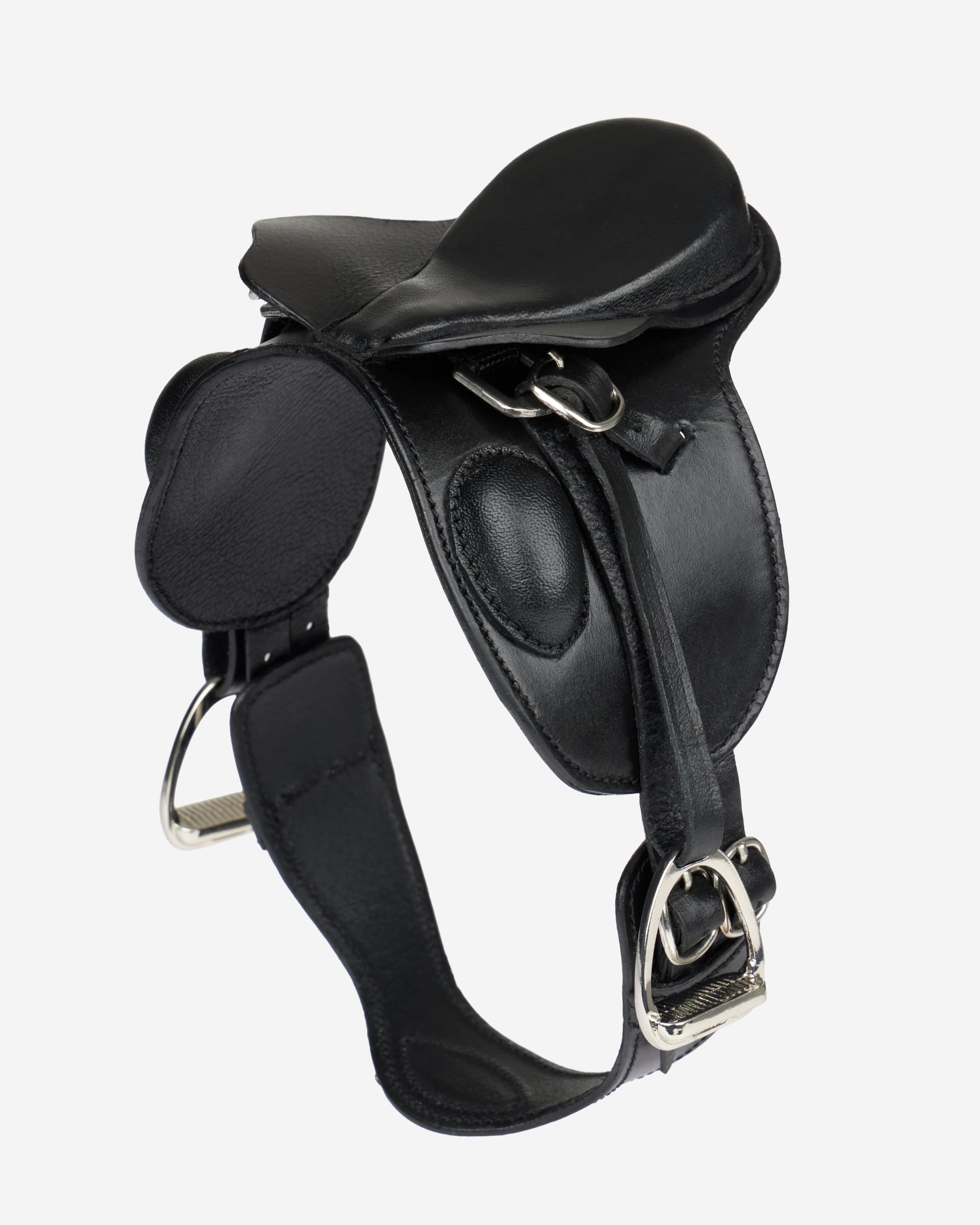 Angled front view of the LeMieux Toy Pony Dressage Saddle and Girth on a plain background