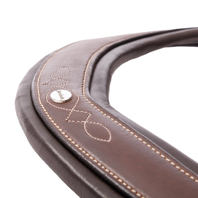 Close-up view of the Brown Kavalkade Jerome Breastplate on a white background