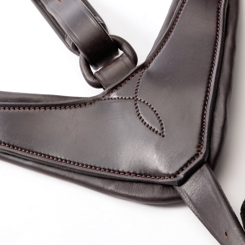 Close-up view of the Brown/Brass Kavalkade Robin 3-Point Elastic Breastplate on a white background