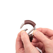 Close-up view of a model showing the martingale ring on the Brown Kavalkade Azriel Padded Martingale on a white background