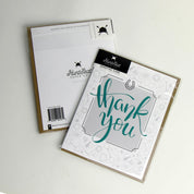 Side-by-side front and back view of the Thank You Hunt Seat Paper Co. Greeting Cards on a plain background