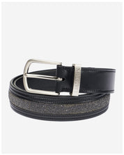 View of a rolled up Black LeMieux Crystal Insert Belt on a plain background