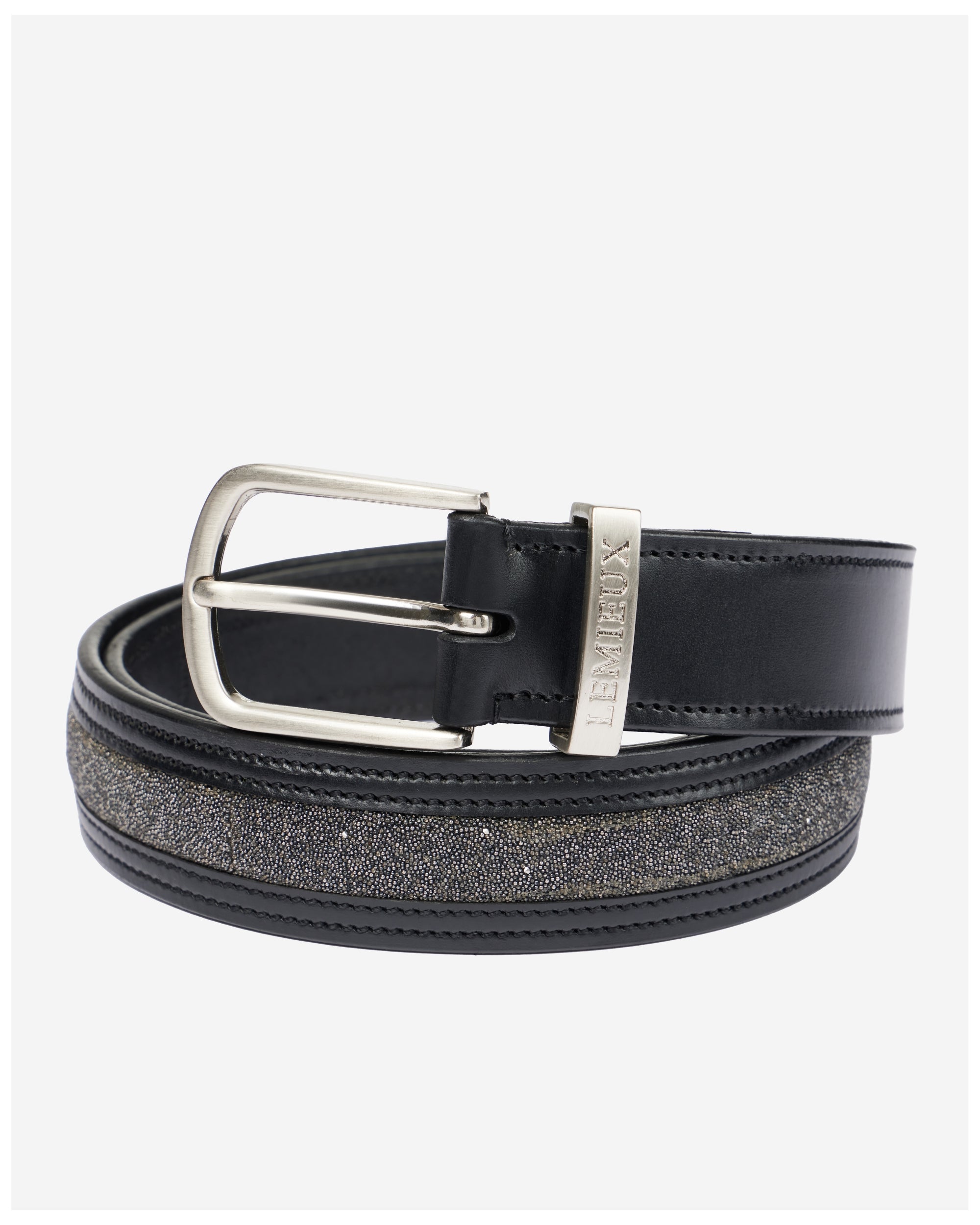 View of a rolled up Black LeMieux Crystal Insert Belt on a plain background