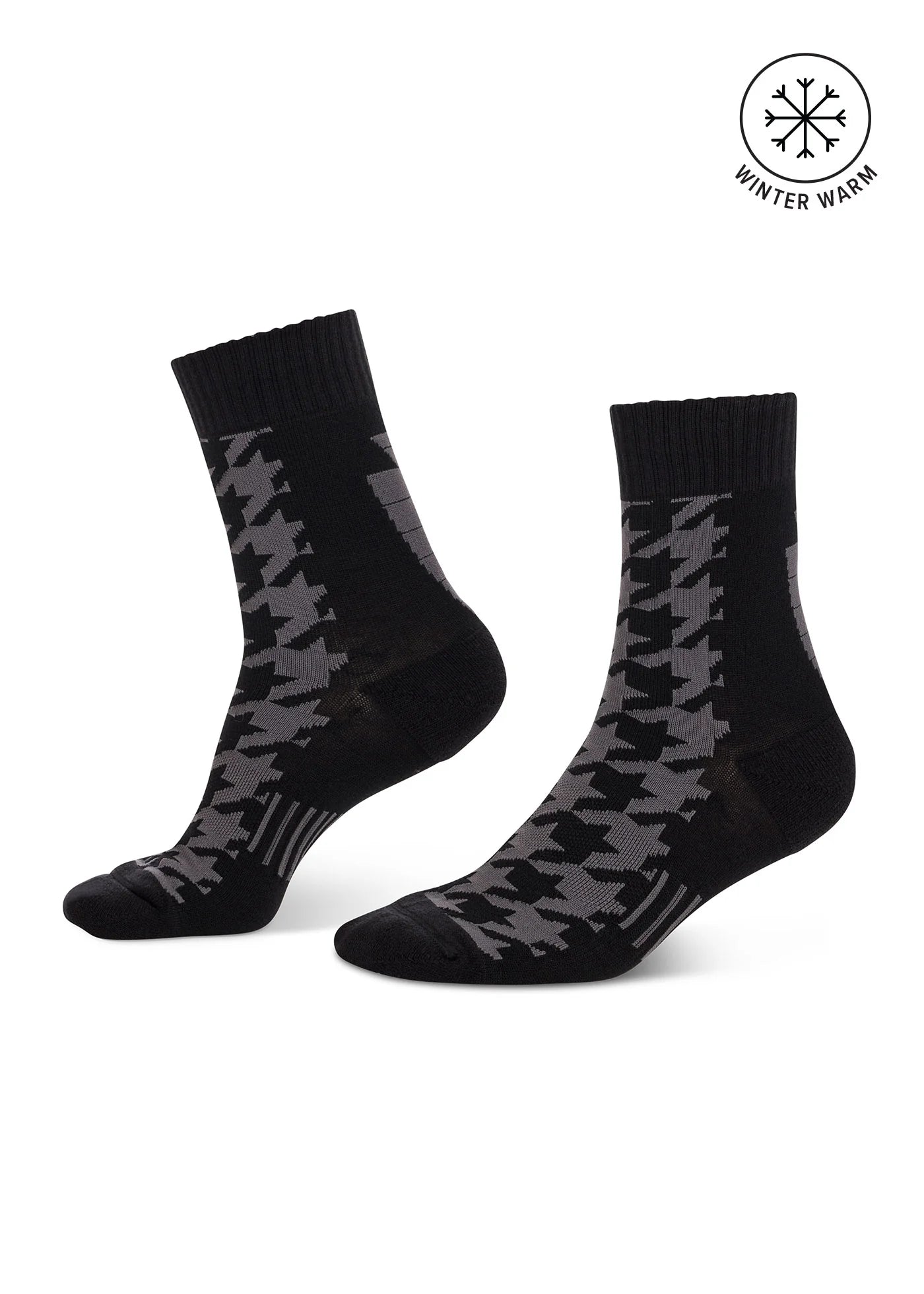 Side views of a pair of black Kerrits Houndstooth Wool Paddock Boot Socks on a white background