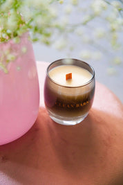 Angled front view of the Clean Barn Stable Style Soy Wax Candle