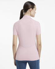 Back view of a female model wearing the Blossom LeMieux Maria Mesh Short Sleeve Sun Shirt on a plain background