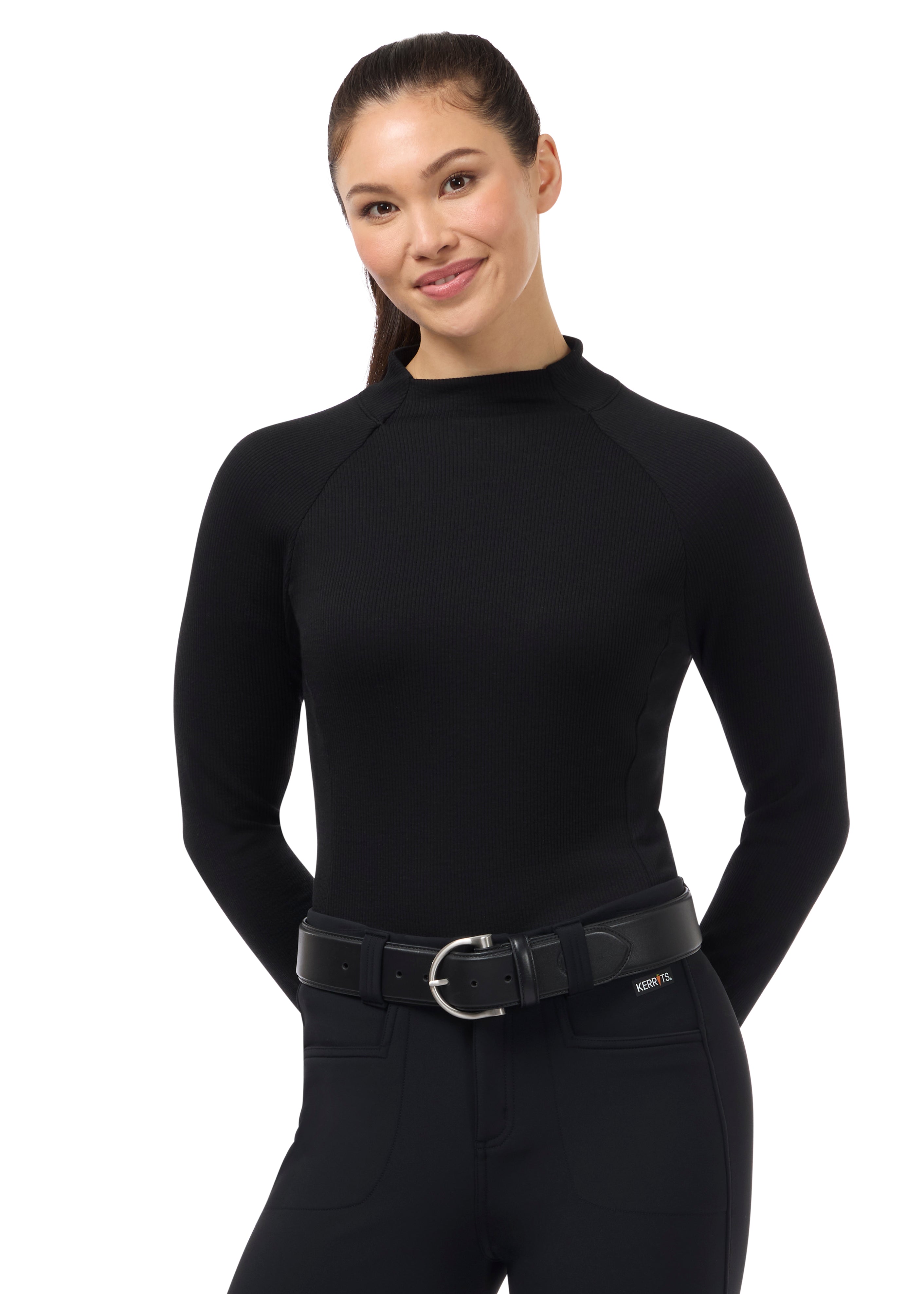 Front view of a female model wearing the Black Kerrits Align Textured Mock Neck on a plain background