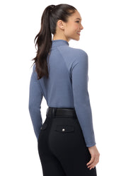 Front view of a female model wearing the Dusty Blue Kerrits Align Textured Mock Neck on a plain background