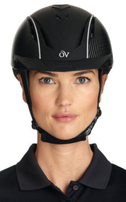 Front view of a female model wearing the Ovation Sync with Carbon Fiber Helmet on a white background