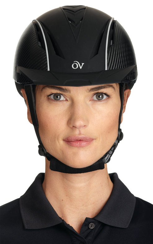 Front view of a female model wearing the Ovation Sync with Carbon Fiber Helmet on a white background