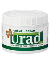 Front view of a 7oz container of Urad Total Leather Care Cream in neutral on a white background
