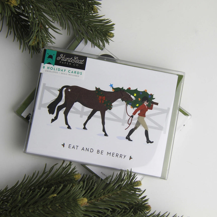 Front view of the Eat & Be Merry Hunt Seat Paper Co. Holiday Card in its packaging