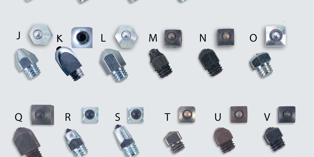 Full view of all the Nunn Finer Steel Horseshoe Studs on a plain background