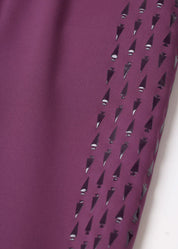 Close-up view of the fabric on the purple Kerrits Kids Coolcore Full Seat Tech Tights
