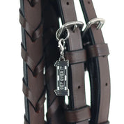 View of the Get Over it Dapplebay Bridle Charm on a brown bridle on a white background