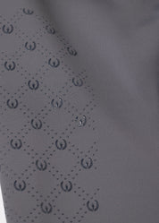 Closeup view of the Carbon Kerrits Free Motion Coolcore Knee Patch Breech showing the silicone grip