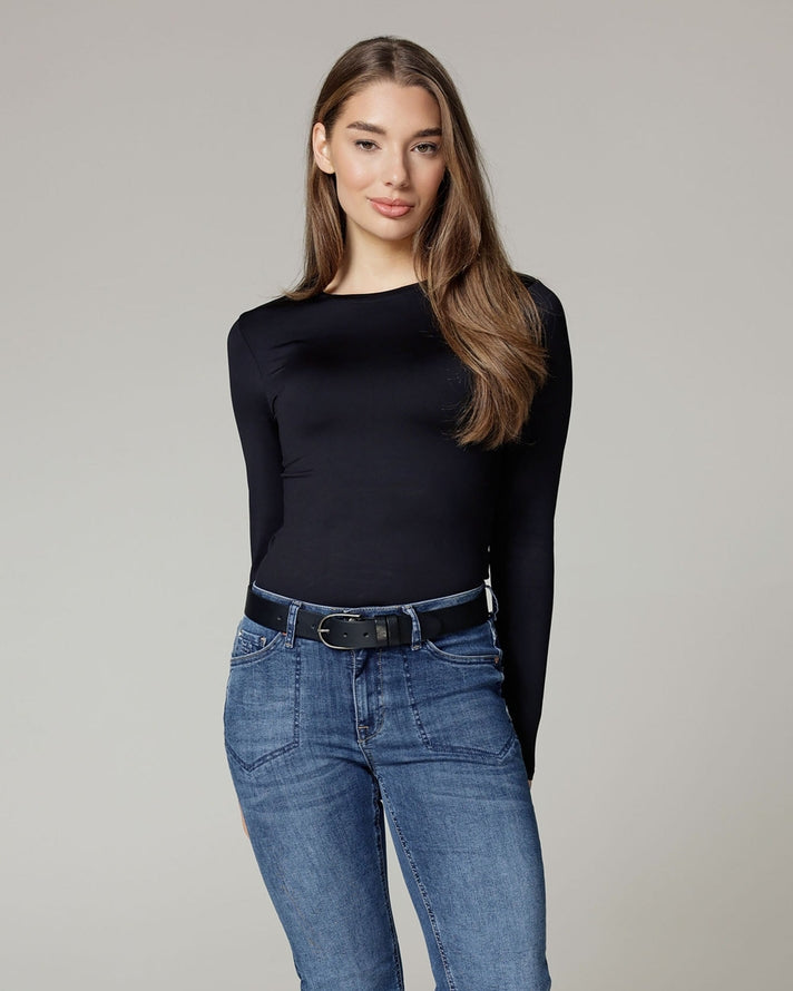 silver Amsterdam Heritage Dieke Classic Leather Belt with blue jeans on a plain background