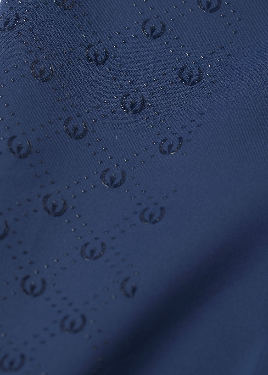 Closeup view of the Nightfall Kerrits Free Motion Coolcore Knee Patch Breech showing the silicone grip
