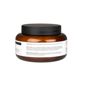 Back view of a jar of the Acavallo Beeswax Leather Conditioner on a white background