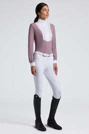 Angled front view of a female model wearing the purple Cavalleria Toscana American Long Sleeve Competition Shirt on a plain background