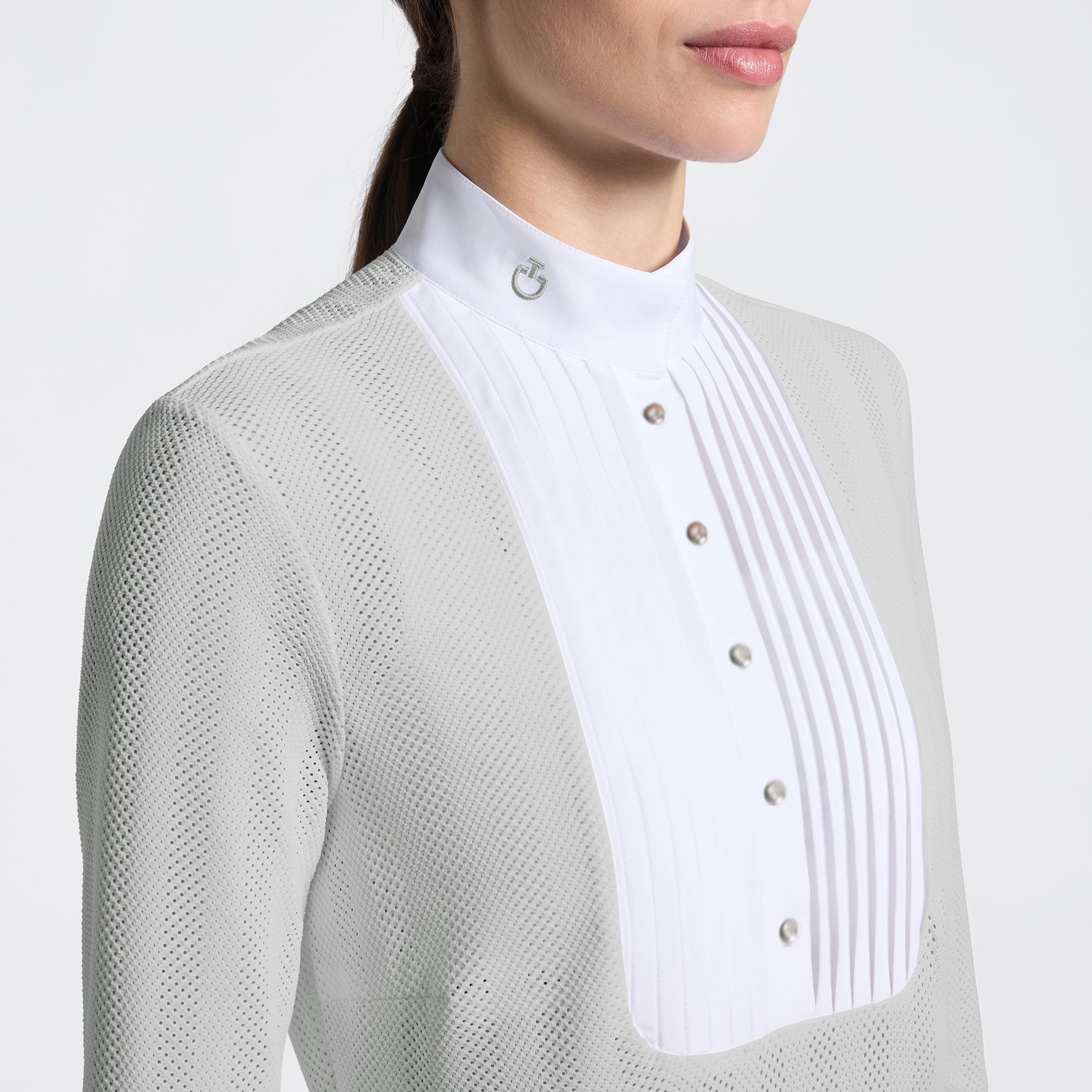 Close-up front view of a female model wearing the gray Cavalleria Toscana Long Sleeve Jacquard Jersey Competition Shirt on a plain background