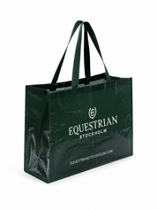 Angled front view of the Sycamore Green Equestrian Stockholm Stable Bag on a white background