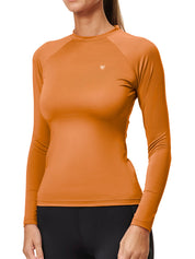 Front view of a female model wearing the Chestnut Equestrian Stockholm Dynamic Long Sleeve Base Layer on a white background