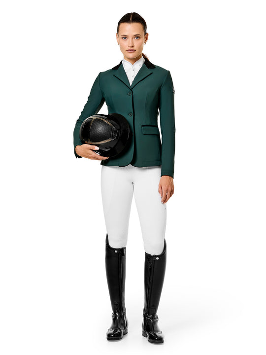 Full body front view of a female model wearing the Sycamore Green Equestrian Stockholm Classic Show Jacket on a plain background