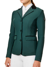 Front view of a female model wearing the Sycamore Green Equestrian Stockholm Classic Show Jacket on a plain background
