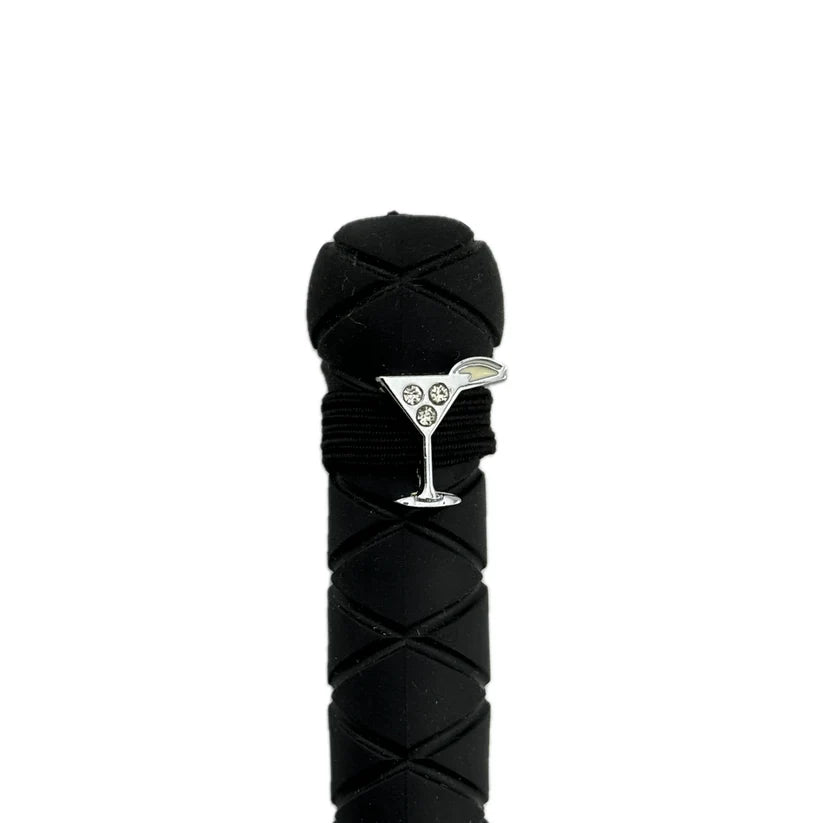 View of the Martini Dubois Cheval Crop Charm on the end of a crop on a white background